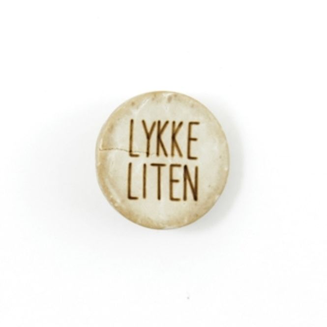 Hovedbilde Lykkeliten knapp