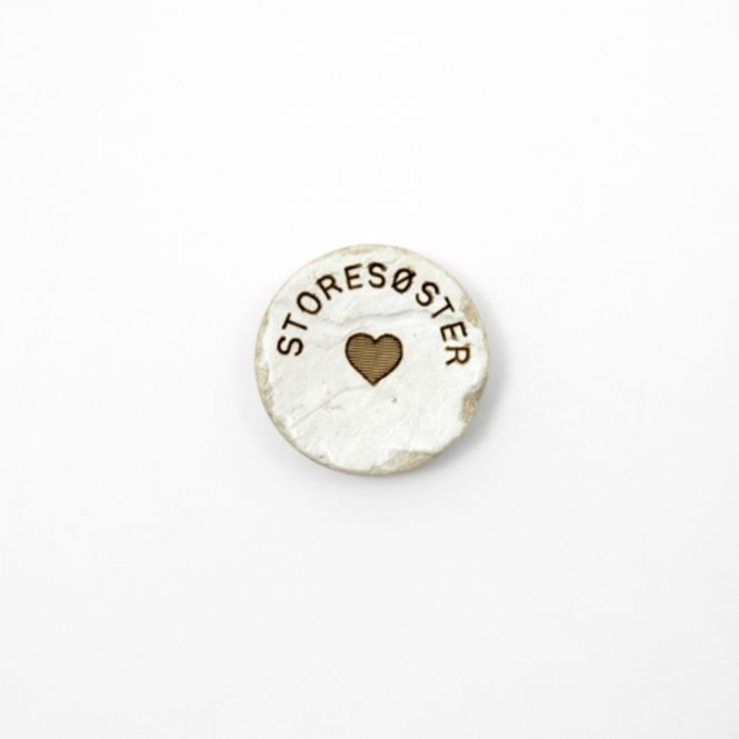 Hovedbilde Storesøster knapp