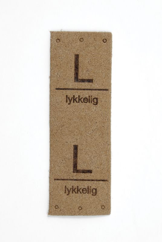 Symerke L - lykkelig
