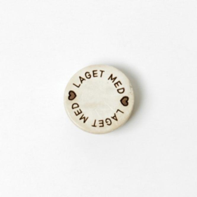 Hovedbilde Laget med ♥ knapp